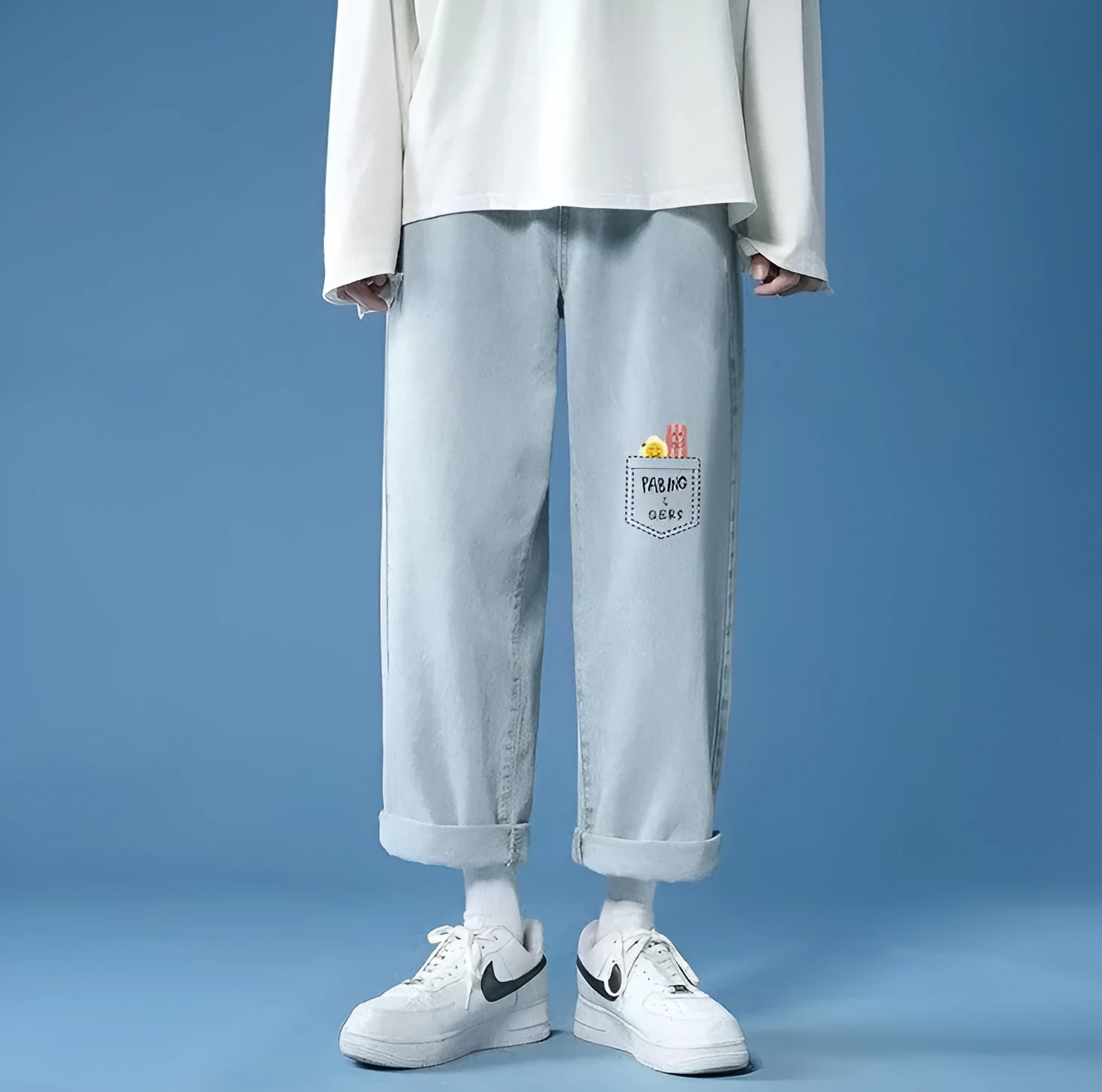 Casual light coloured straight fit cropped jeans for men in light blue with slight elastic waistband and mid rise