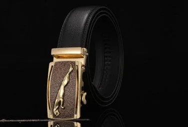 Men's two-layer cowhide belt with gold alloy automatic buckle on a flat surface