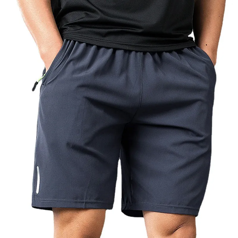 Men's polyester solid colour beach casual sports shorts with zippered pocket in black, gray, and blue