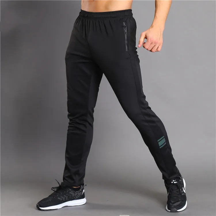 Black running fitness trousers with colour-changing reflective print, slim fit, zippered pockets, polyester fabric