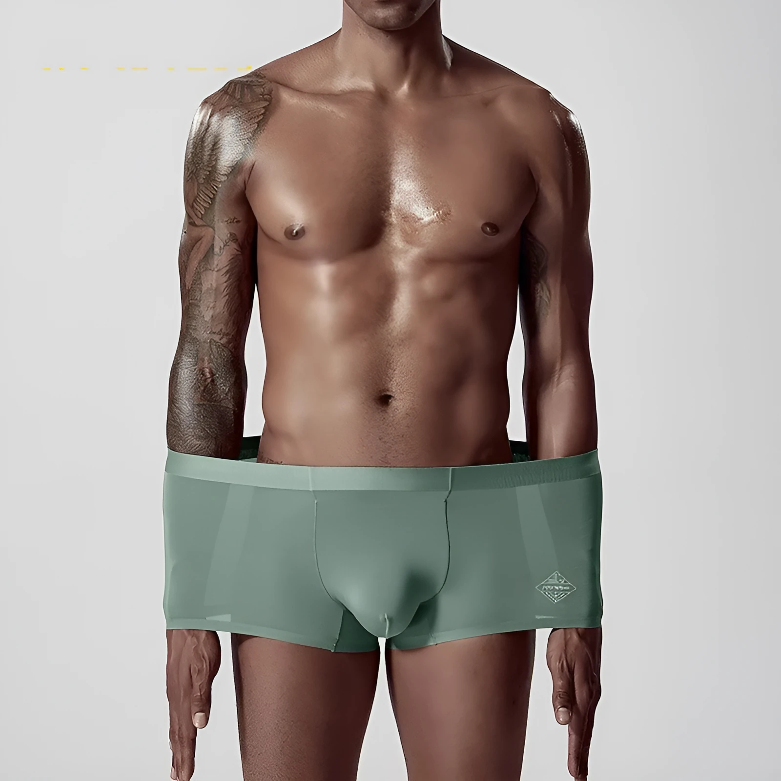 Men's seamless modal underwear in green colour showing mid-waist design and body shaping features