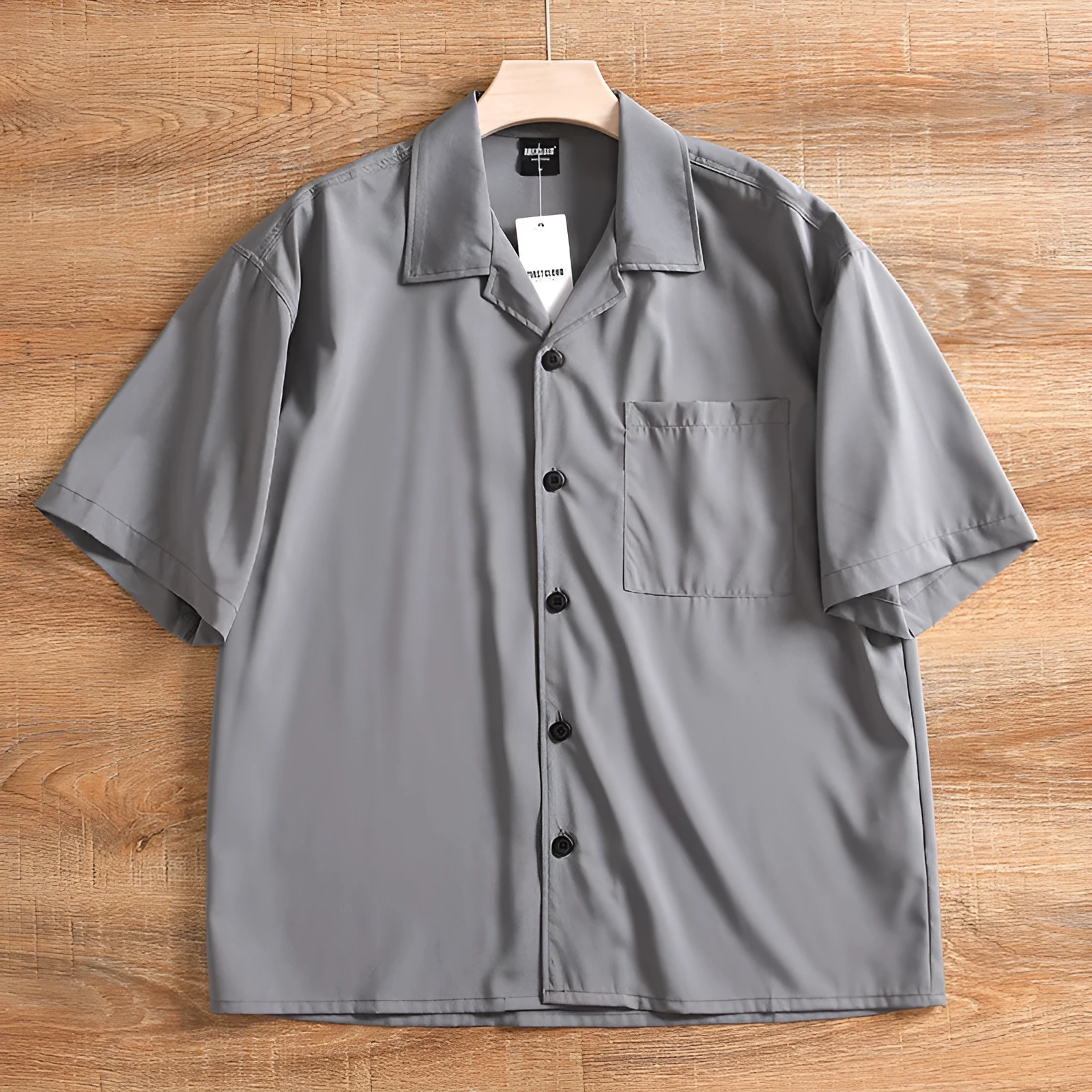 Men's lightweight grey pure cotton short sleeve shirt with a loose, cardigan-style fit.
