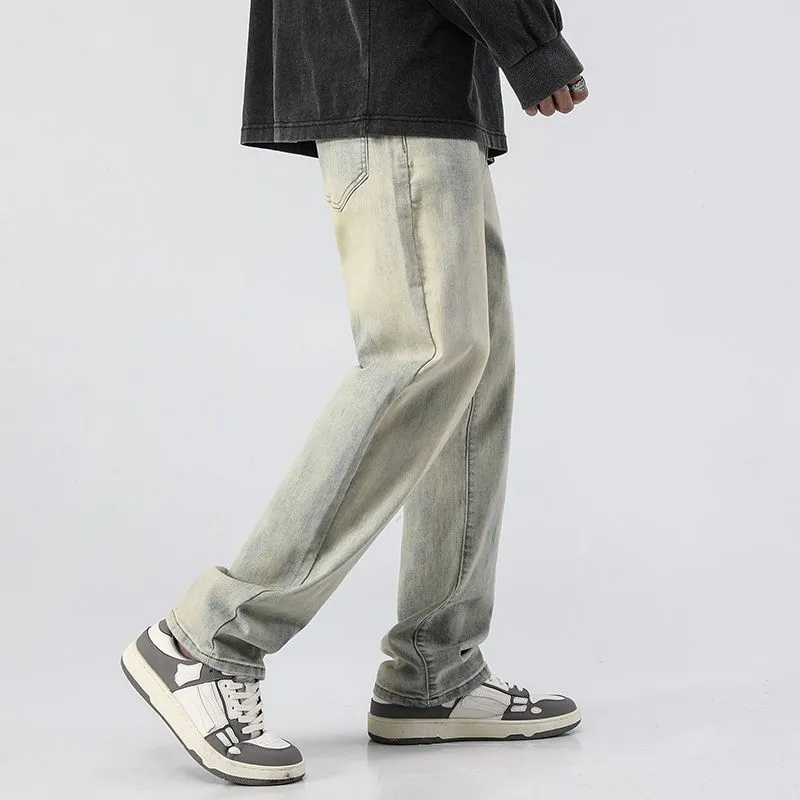 Men's washed distressed slim straight cotton tapered pants in Cement Yellow