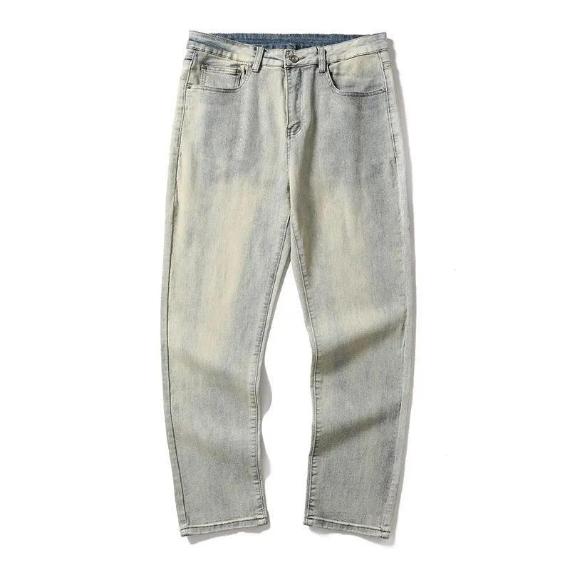 Men's washed distressed slim straight cotton tapered pants in Cement Yellow