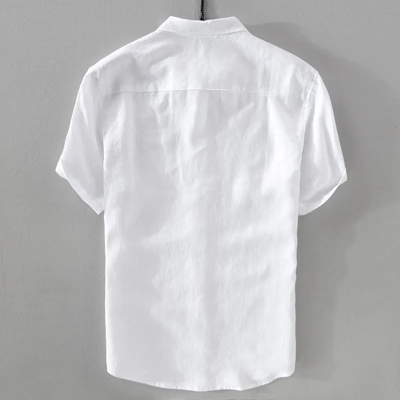Men's solid colour short sleeve linen blend shirt on a hanger, showing loose fit.