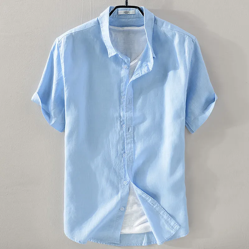 Men's solid colour short sleeve linen blend shirt on a hanger, showing loose fit.