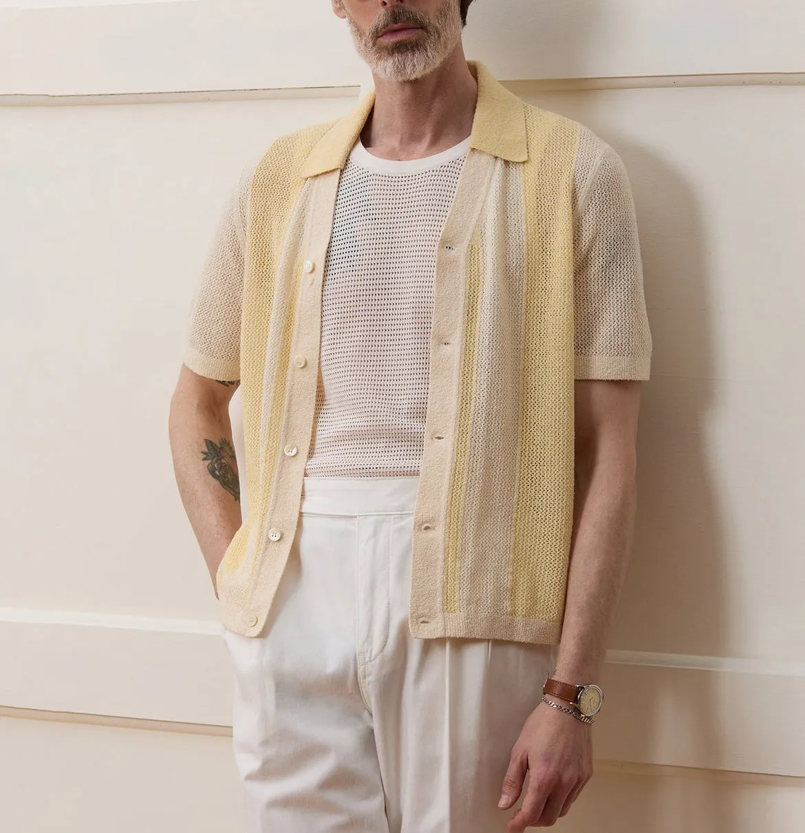 Yellow casual polo shirt with hollow-out asymmetric design and short sleeves in Tencel fabric