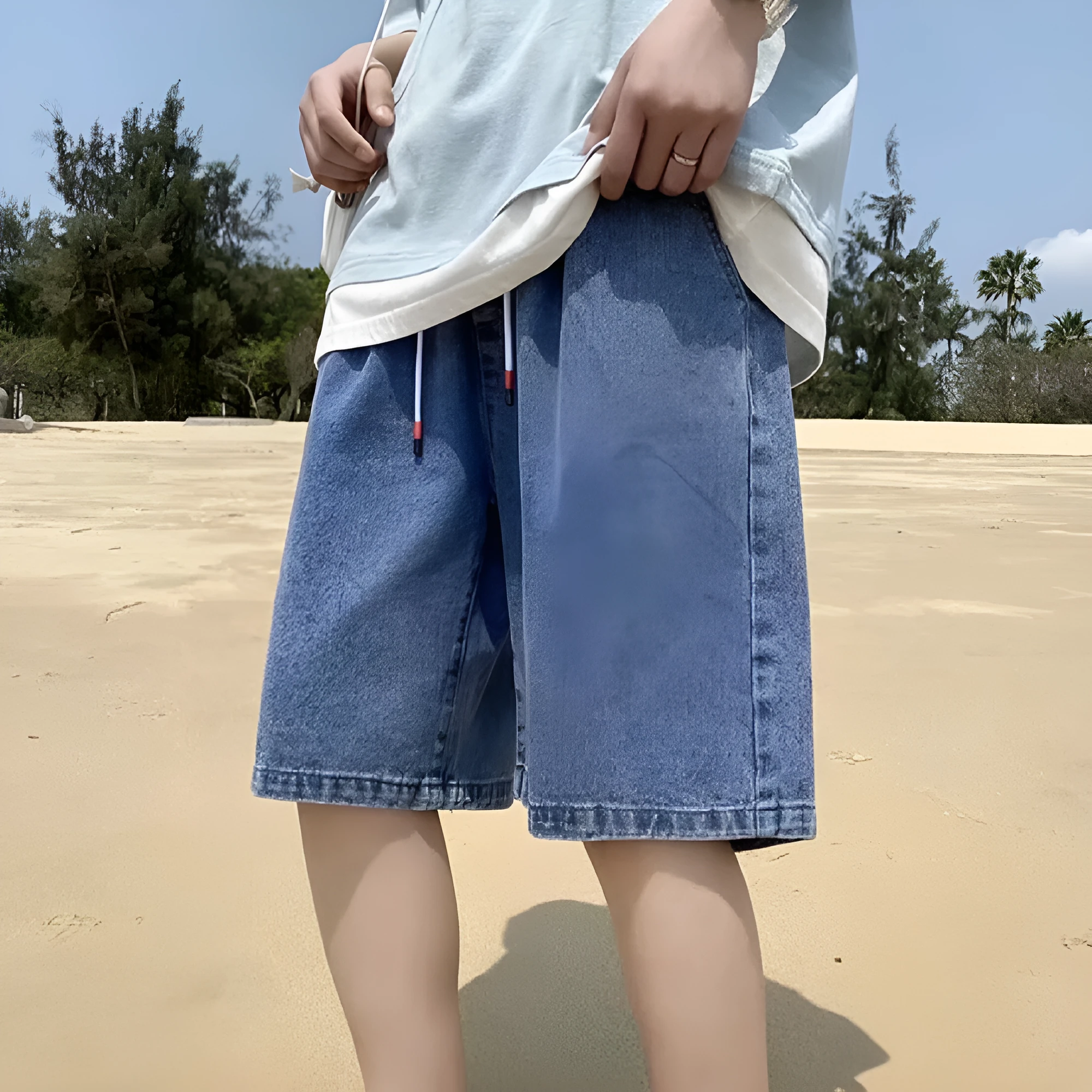 Men's loose straight casual cotton denim shorts in dark blue, front view