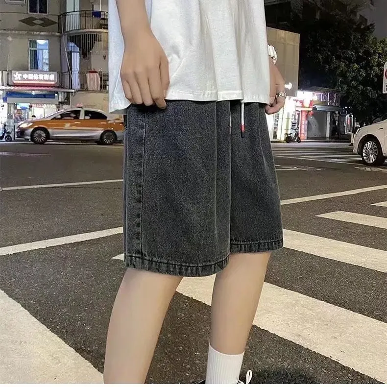 Men's loose straight casual cotton denim shorts in dark blue, front view