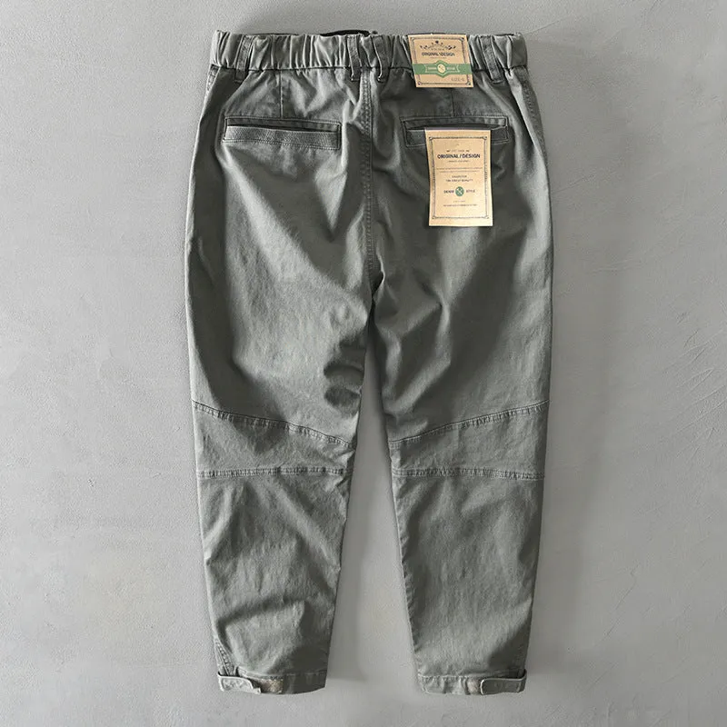 Man wearing khaki cotton elastic casual Japanese overalls with a loose fit.