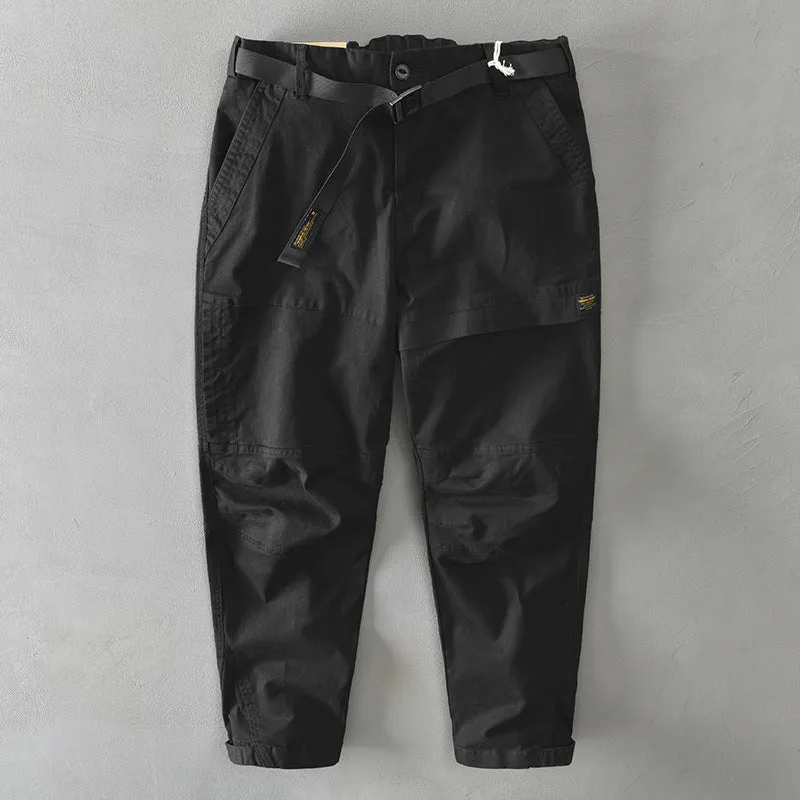 Man wearing khaki cotton elastic casual Japanese overalls with a loose fit.