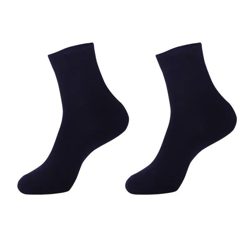 Black, white, and grey boat socks and medium tube socks from Degner in cotton blend fabric