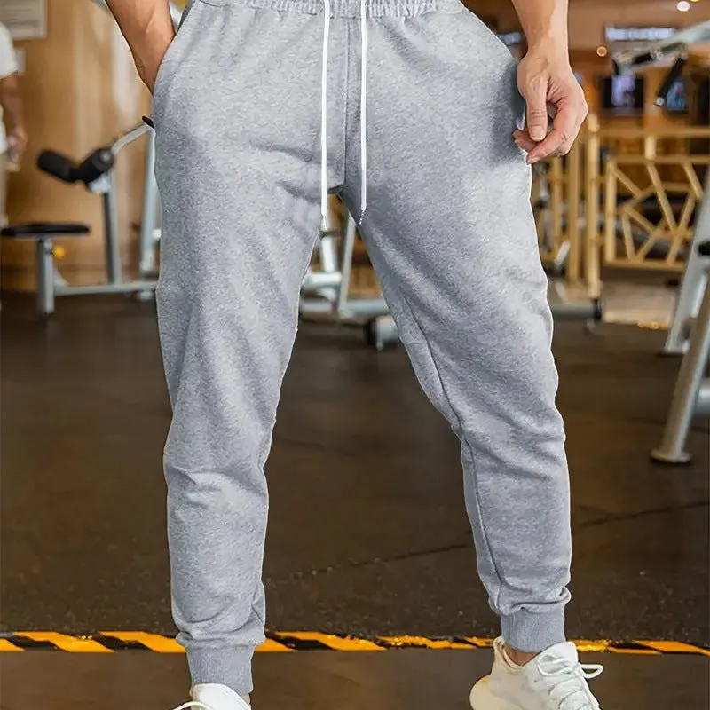 Men's polyester linen leisure trousers with drawstring waist and elasticated calf in loose fit design