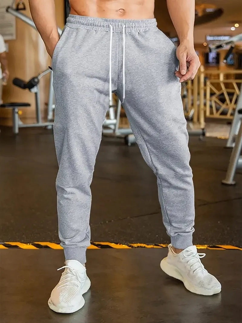 Men's polyester linen leisure trousers with drawstring waist and elasticated calf in loose fit design