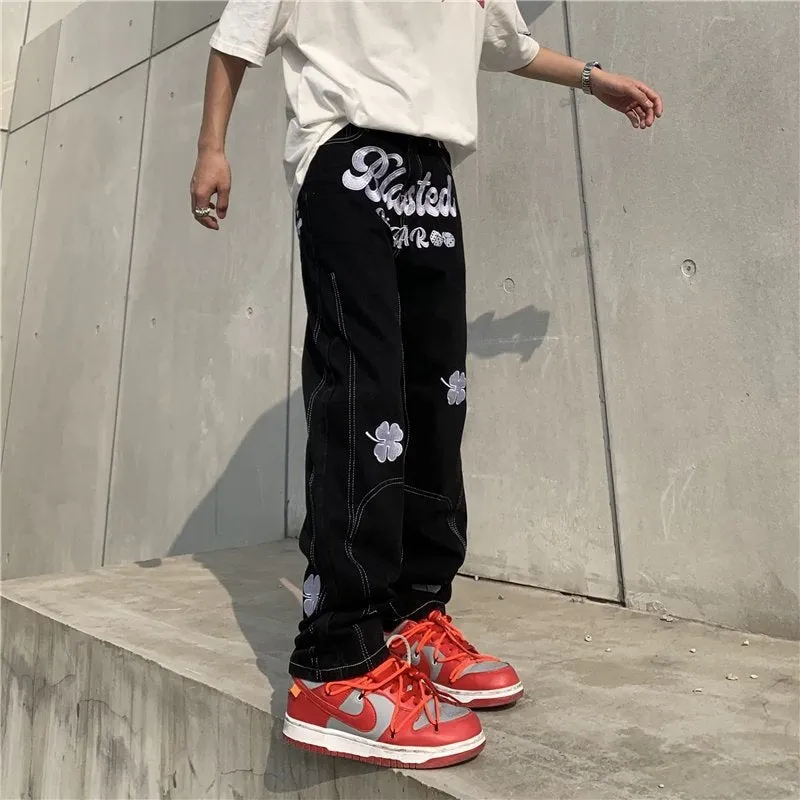 Men's American retro printed casual trousers with button placket and small straight leg in graphic colour