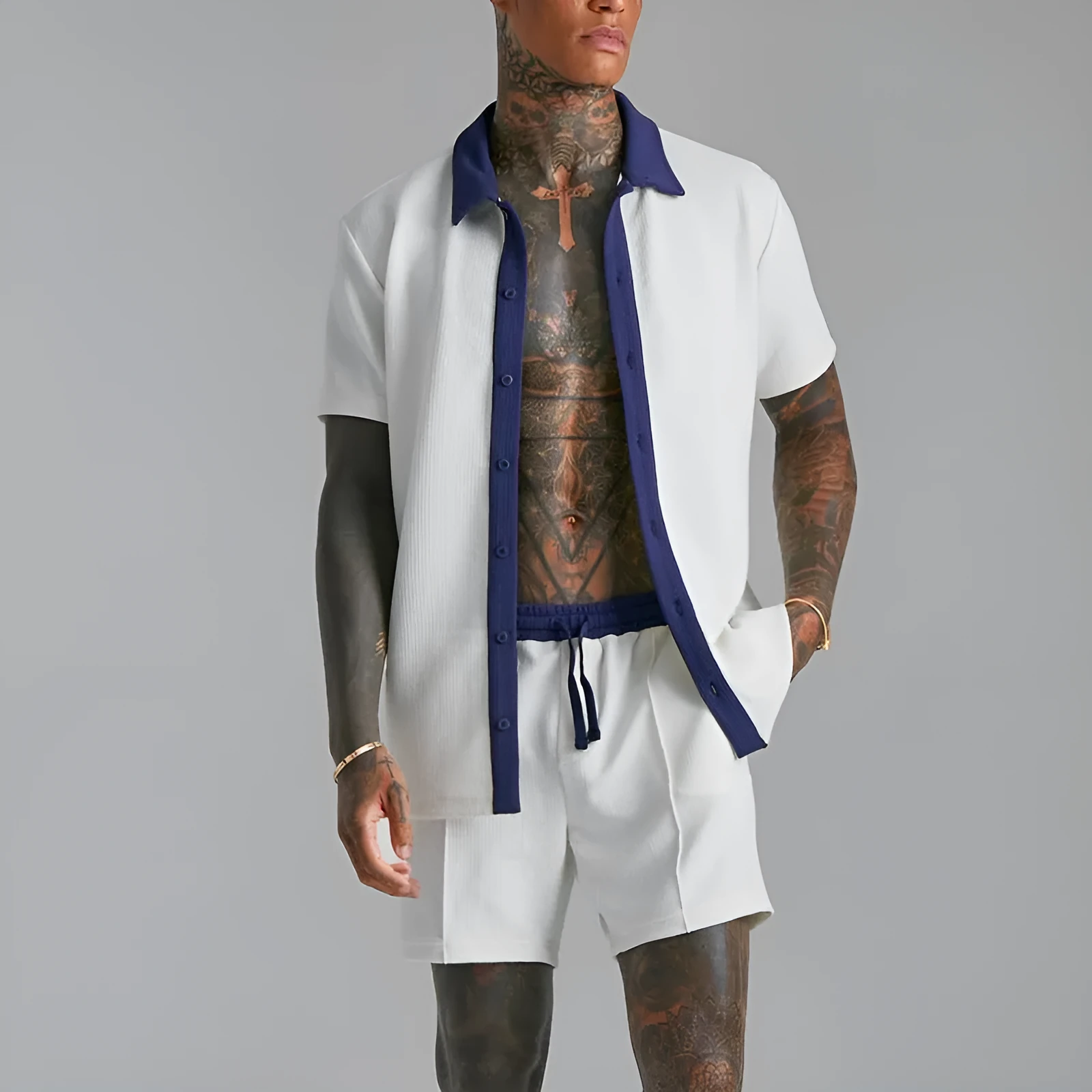 Men's two-piece suit in polyester cloth with printed design, available in black or white