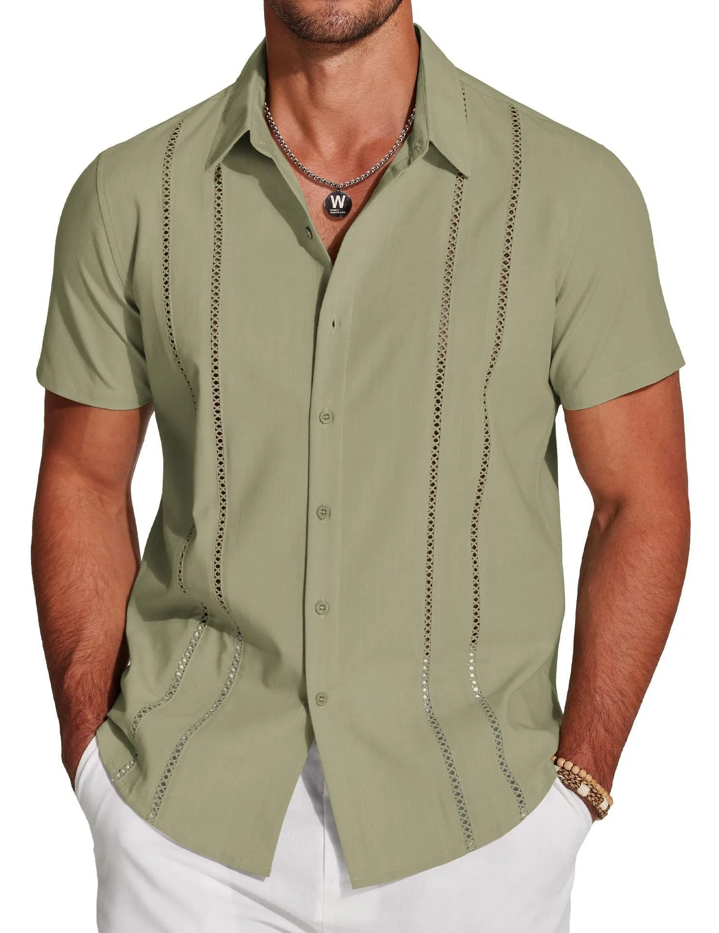 Man wearing a slim fit digital print Hawaiian short sleeve shirt in an elastic fabric
