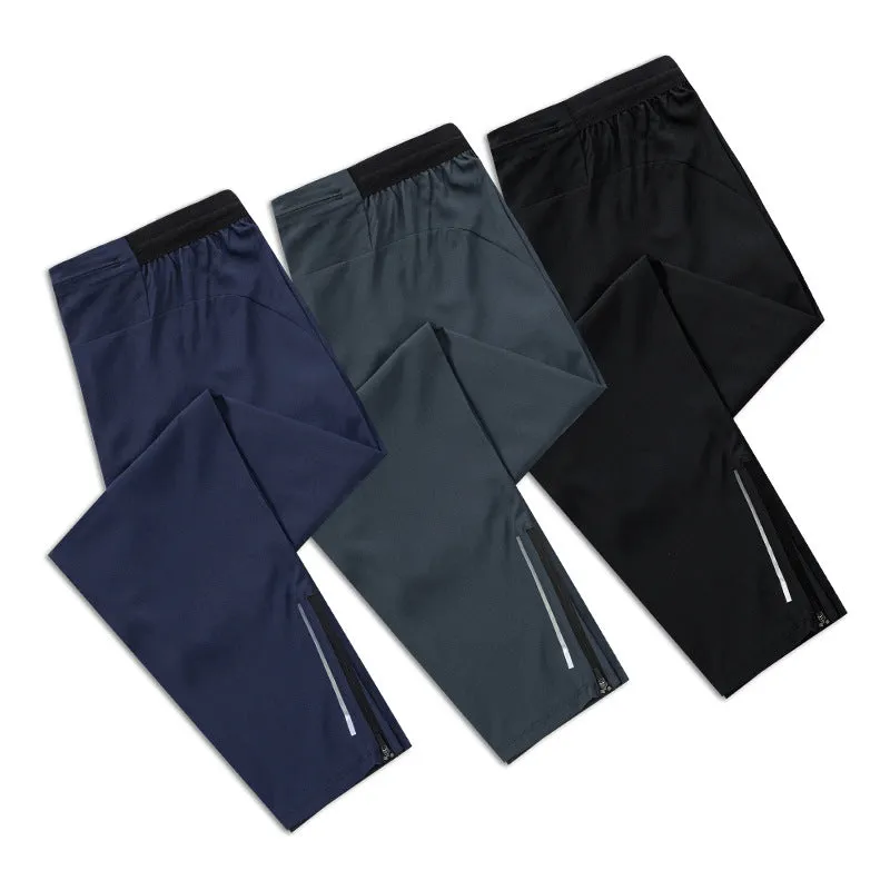 Men's loose quick-drying polyester sports trousers in navy blue, mid-waist with an American style cut for running and fitness