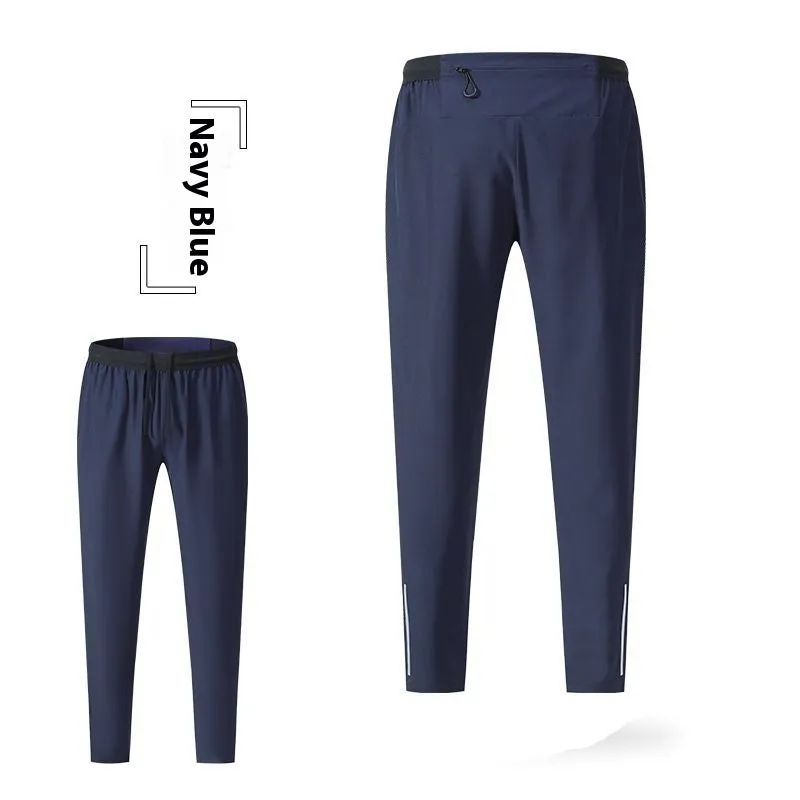 Men's loose quick-drying polyester sports trousers in navy blue, mid-waist with an American style cut for running and fitness
