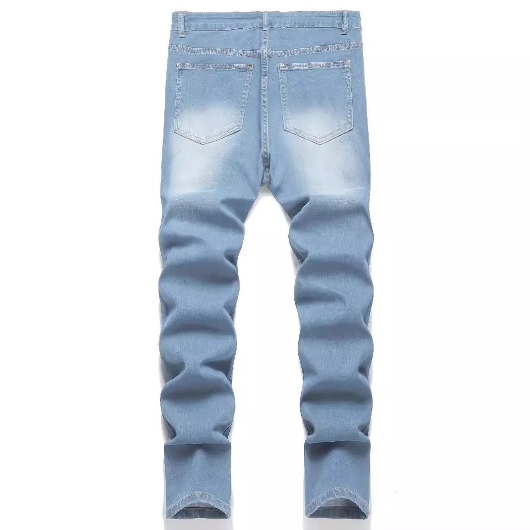 Men's denim jeans with worn-out patch detail in light blue, mid-waist tight fit British style