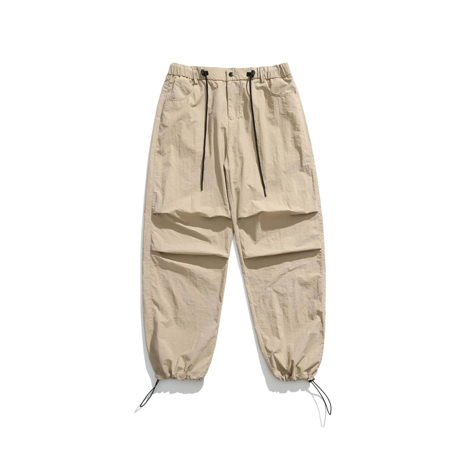 Men's loose straight-leg casual trousers in thin ice silk nylon fabric, shown in apricot colour.