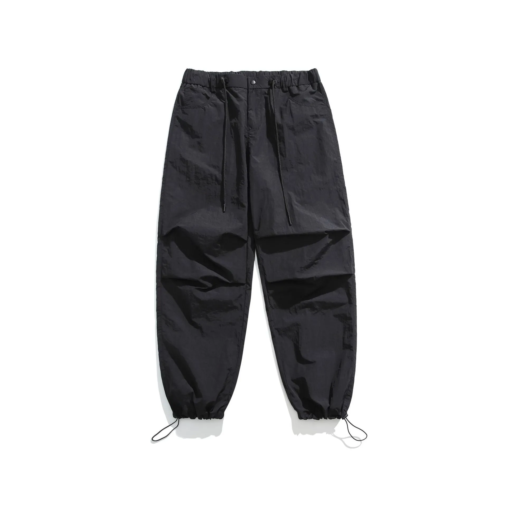 Men's loose straight-leg casual trousers in thin ice silk nylon fabric, shown in apricot colour.