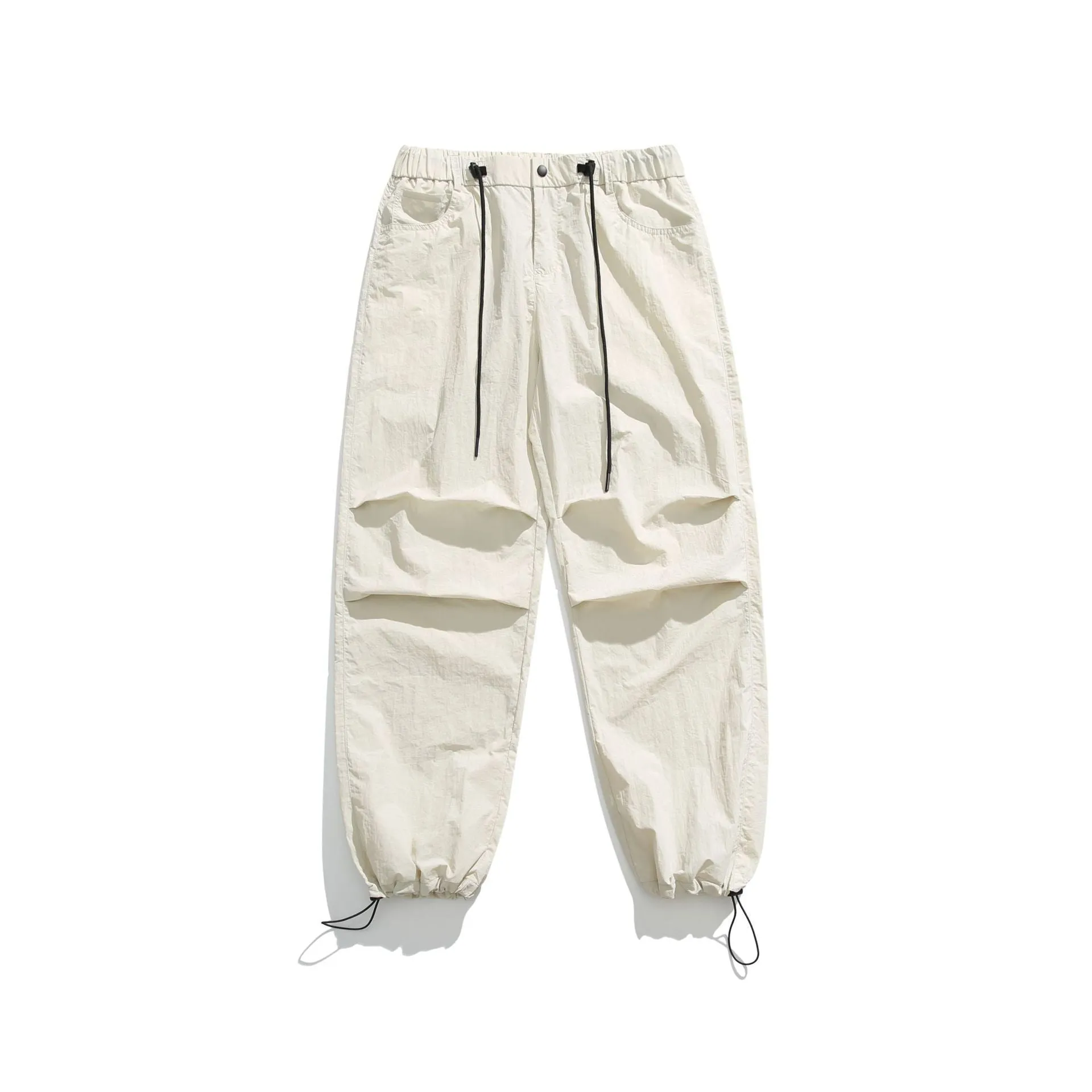 Men's loose straight-leg casual trousers in thin ice silk nylon fabric, shown in apricot colour.