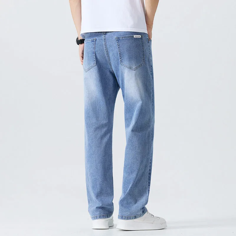 Washed cleanfit men's light blue straight leg denim jeans with zip fly and mid waist