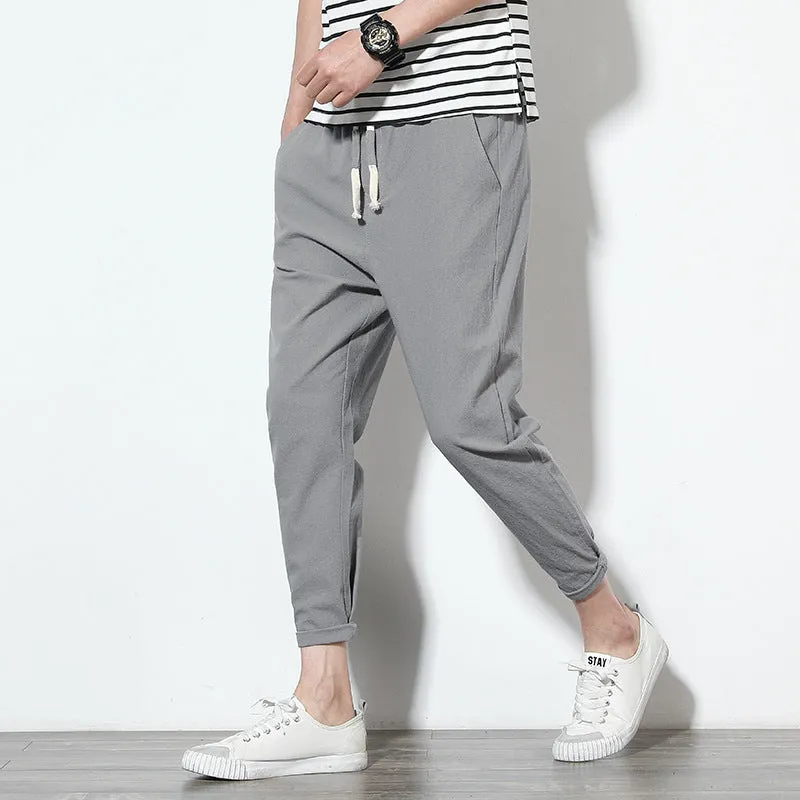 Summer men's loose fit casual trousers in cotton hemp blend with drawstring waist tapered legs nine-tenths length