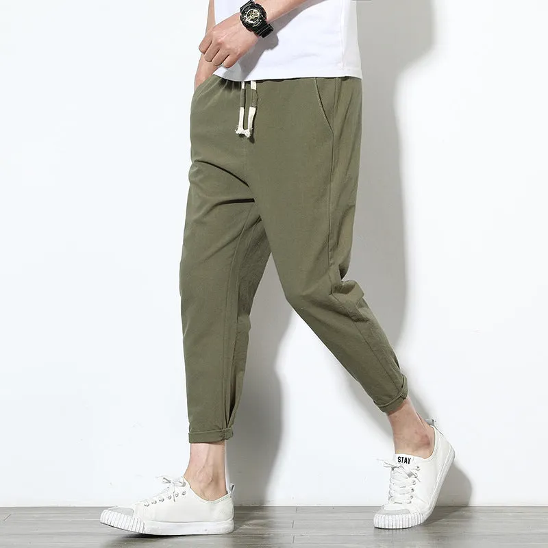 Summer men's loose fit casual trousers in cotton hemp blend with drawstring waist tapered legs nine-tenths length