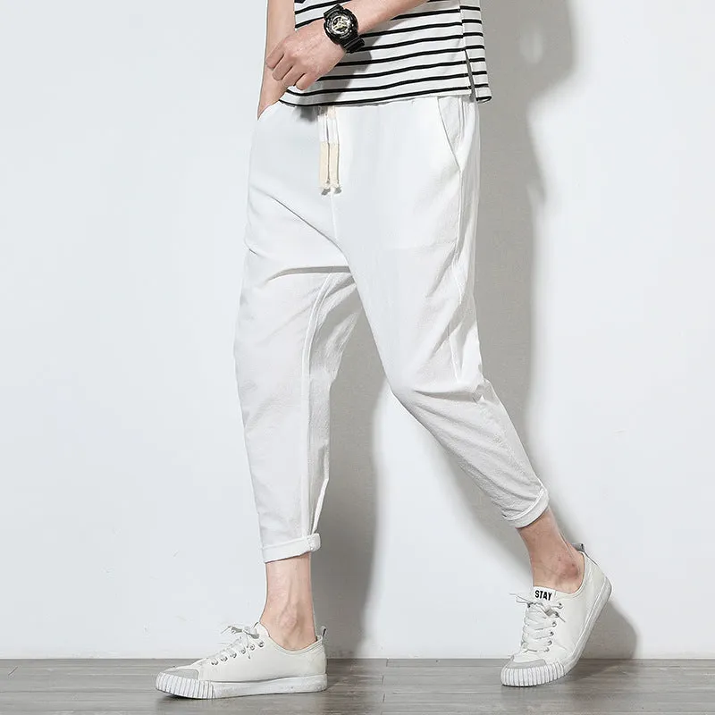 Summer men's loose fit casual trousers in cotton hemp blend with drawstring waist tapered legs nine-tenths length