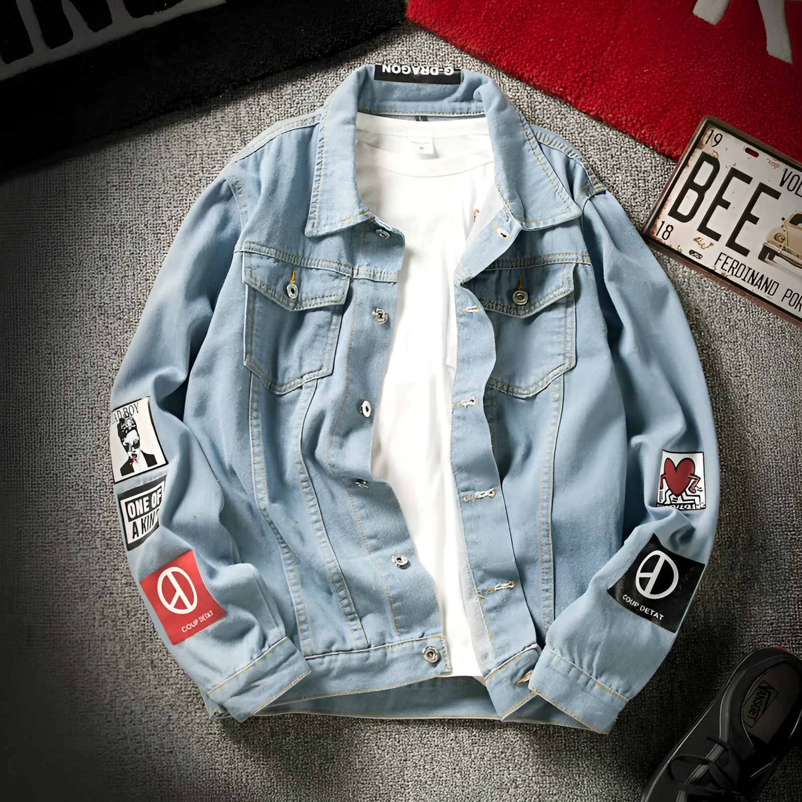 Men's blue denim jacket with lapel collar, single-breasted front, and side seam pockets on a model