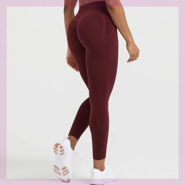 Women's seamless scrunch butt leggings in straight-leg style, available in Black, coal, rosewood, midnight, evergreen, and sage colours
