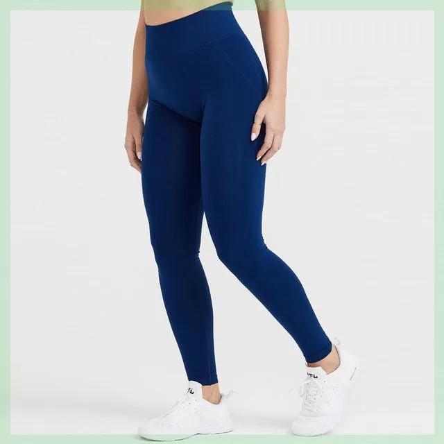 Women's seamless scrunch butt leggings in straight-leg style, available in Black, coal, rosewood, midnight, evergreen, and sage colours