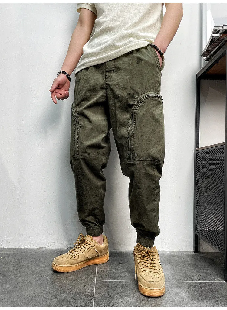 Men's loose fit cotton cargo trousers with elastic waist and zipper pockets in army green