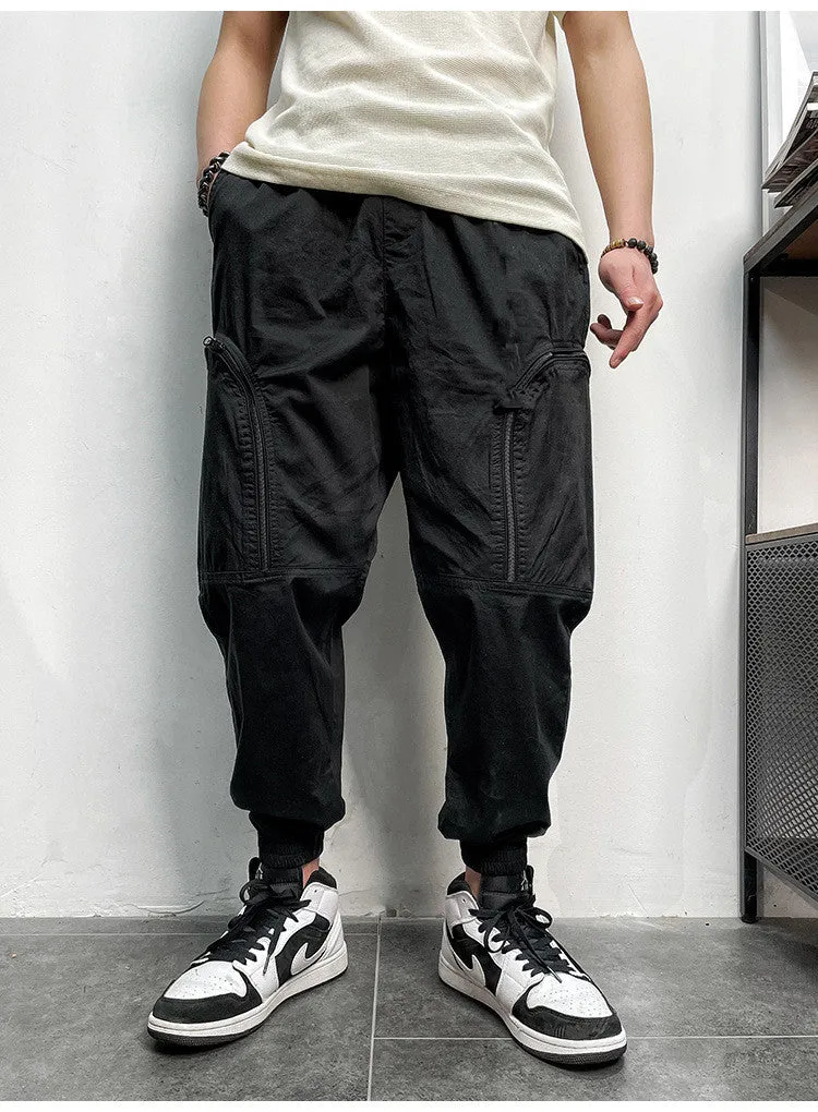Men's loose fit cotton cargo trousers with elastic waist and zipper pockets in army green