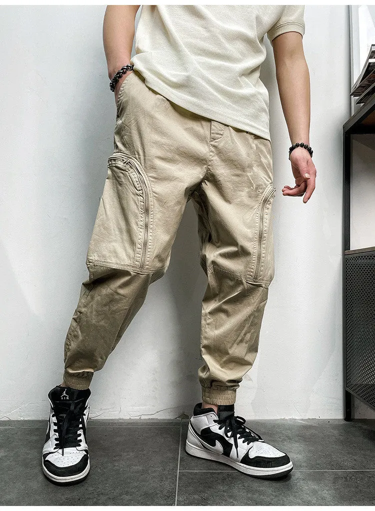 Men's loose fit cotton cargo trousers with elastic waist and zipper pockets in army green