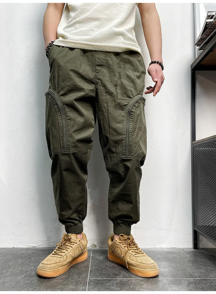 Men's loose fit cotton cargo trousers with elastic waist and zipper pockets in army green