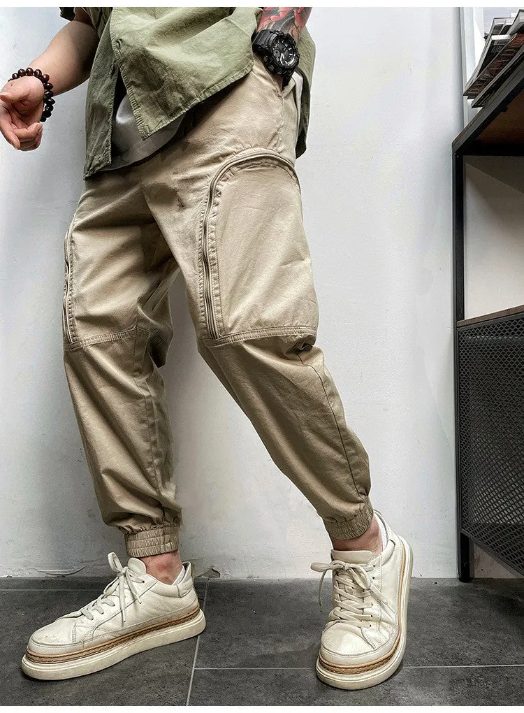 Men's loose fit cotton cargo trousers with elastic waist and zipper pockets in army green