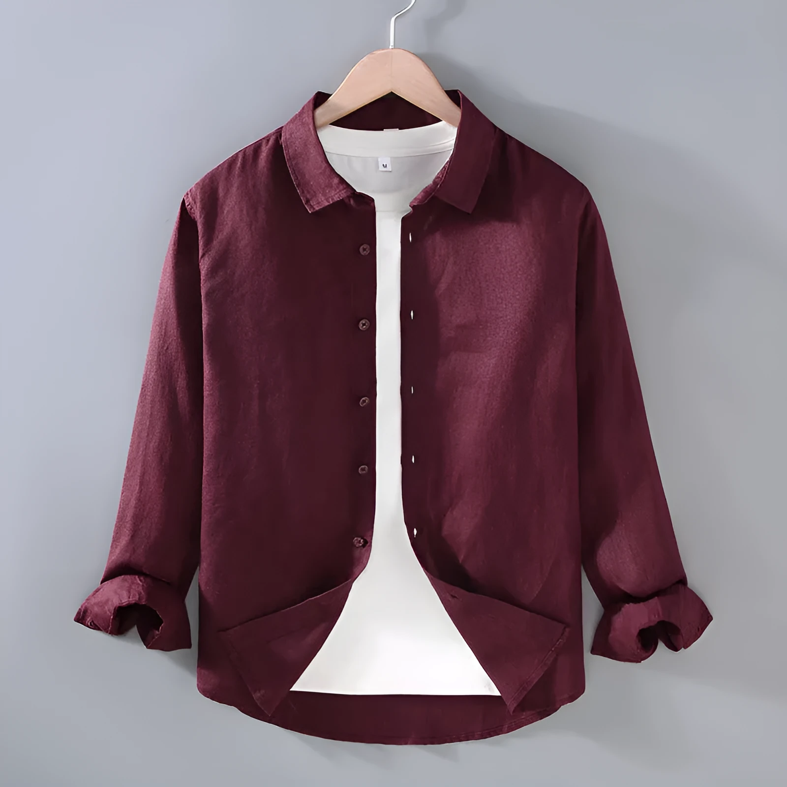 Men's solid colour linen shirt in a simple long-sleeve cardigan style.