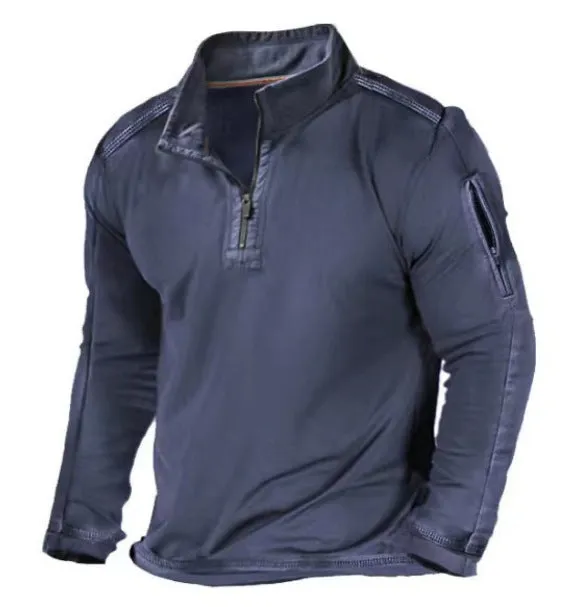 Man wearing a dark-coloured zip-front stand collar polyester sweater.
