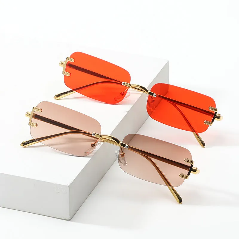 Retro square frameless sunglasses with gold metal frame and black/grey AC lenses