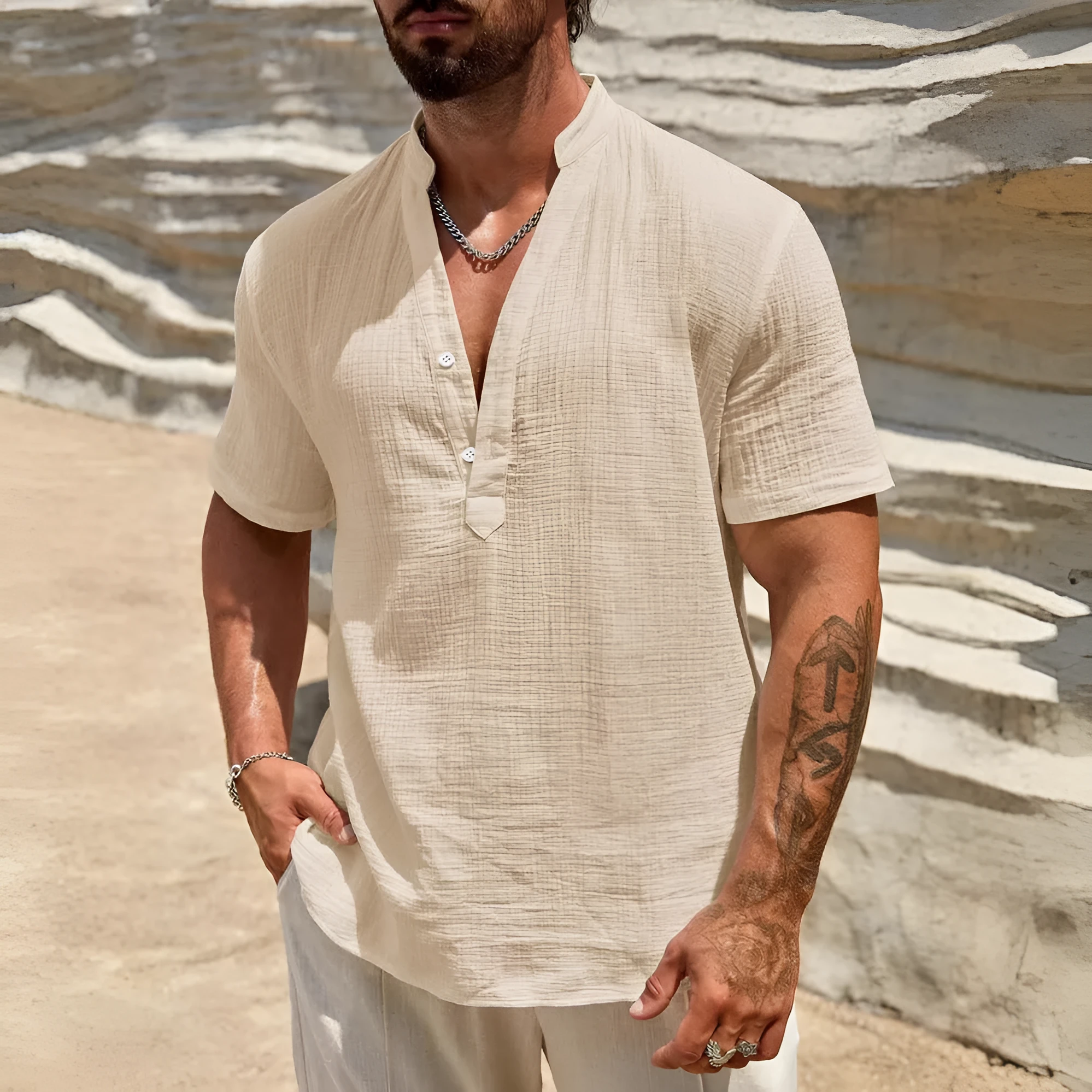 Men's solid colour stand collar short-sleeved casual shirt laid flat, showing thin fabric and slit detail.