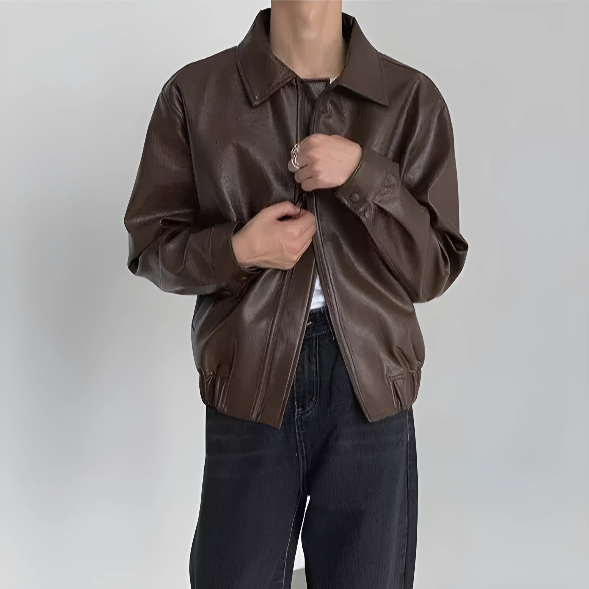 Korean-style brown PU leather jacket with straight hem, shown front view, available in sizes M to XXL