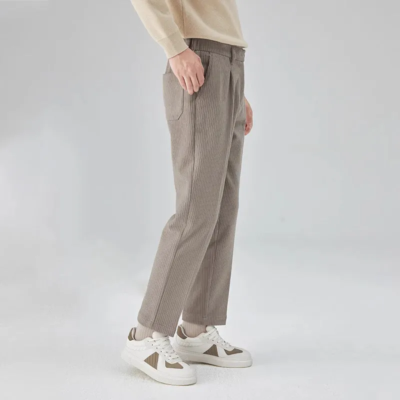 Men's straight-leg corduroy trousers in beige colour showing mid-waist design and loose fit