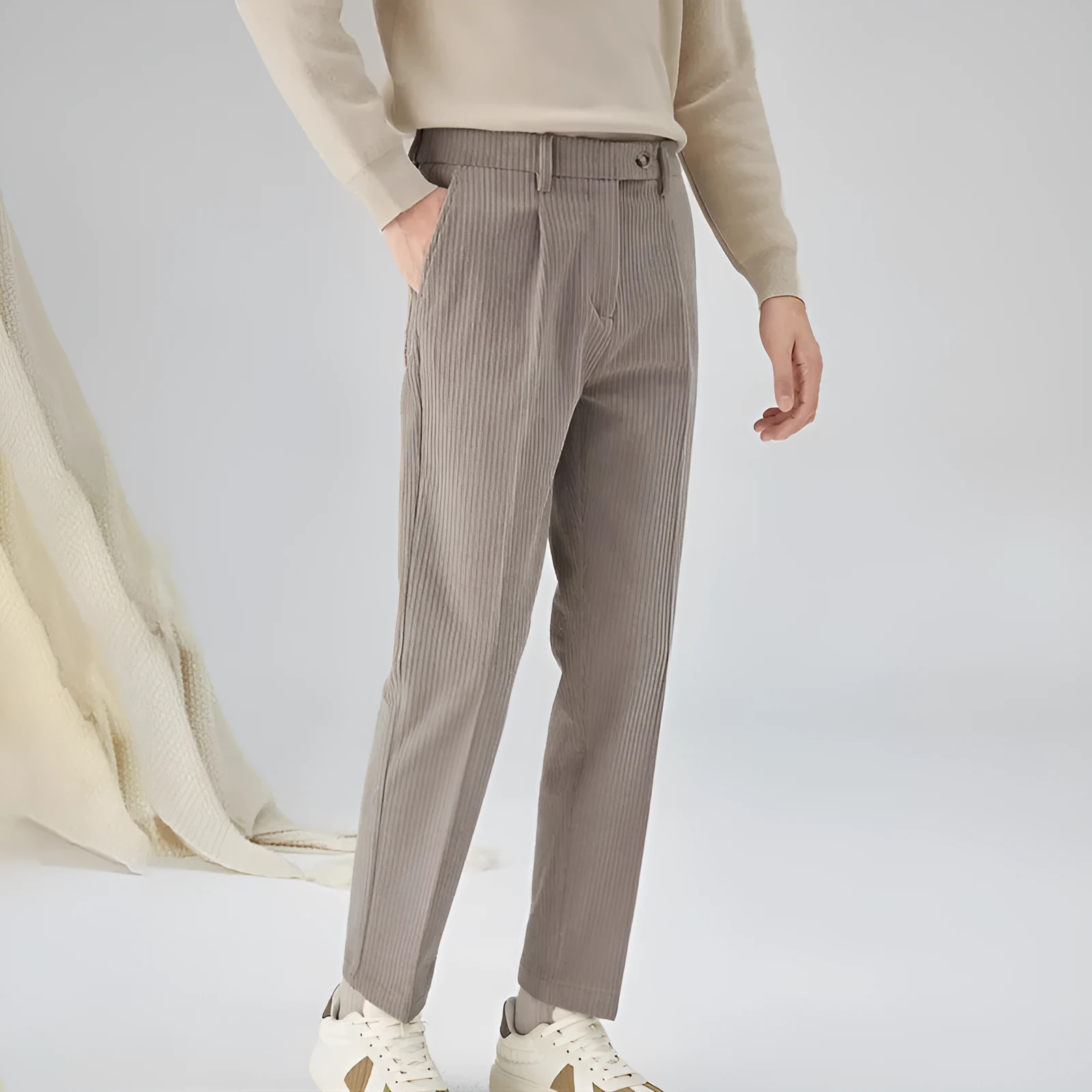 Men's straight-leg corduroy trousers in beige colour showing mid-waist design and loose fit