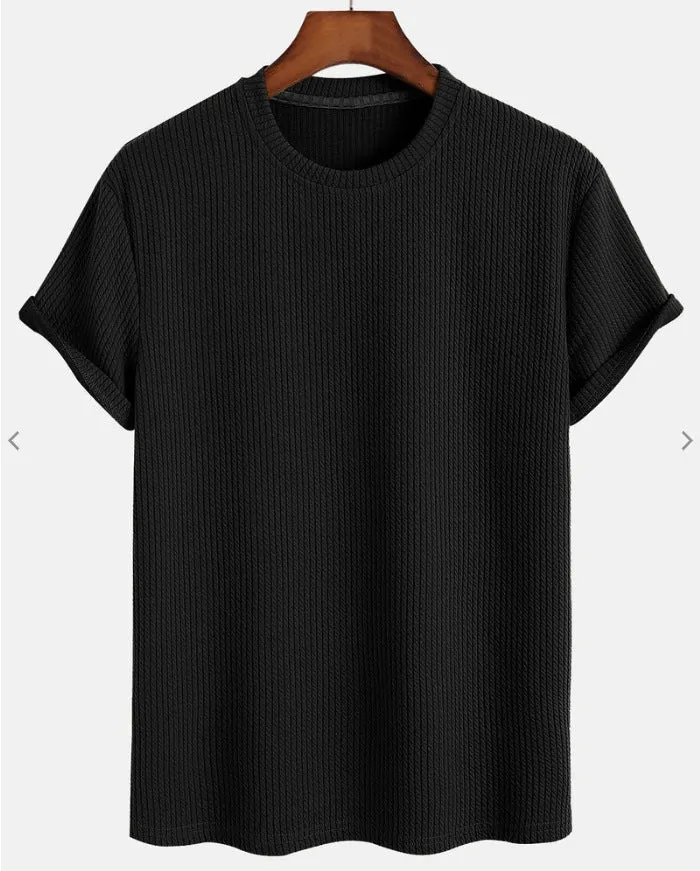 Men's solid colour loose round neck T-shirt in black, size M, on a plain background