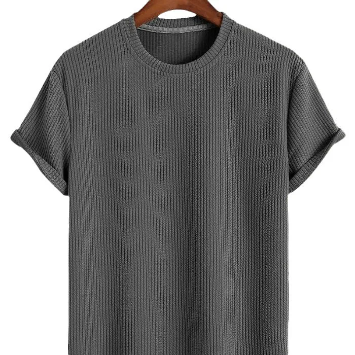 Men's solid colour loose round neck T-shirt in black, size M, on a plain background