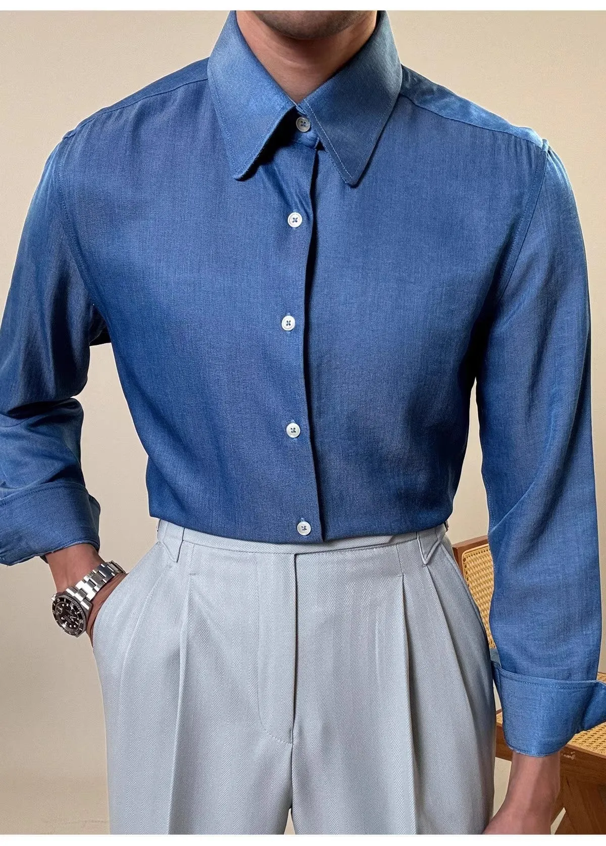Men's blue round collar long sleeve shirt in slim fit design for casual and business wear