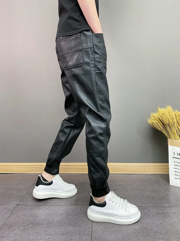 Black waterproof windproof casual rider motorcycle tapered pants with artificial leather lining and mid-rise waist